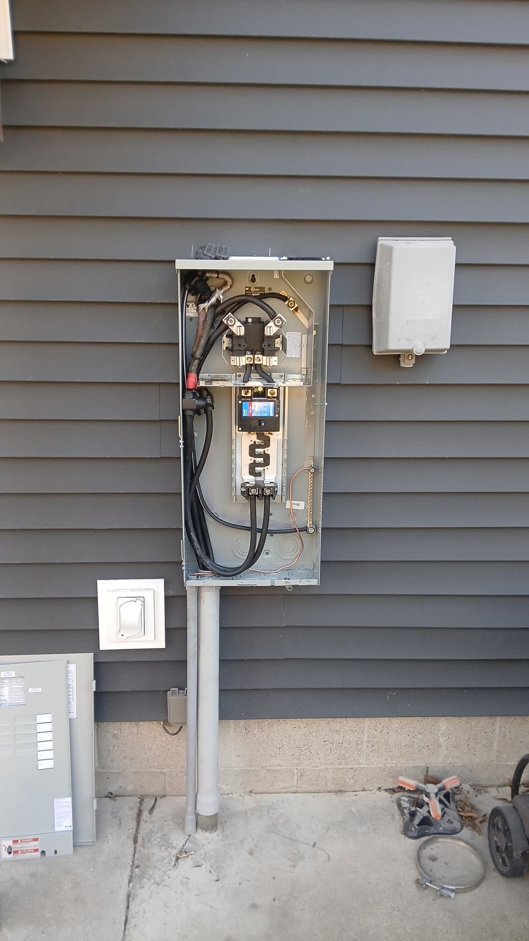 Exterior meter base and service entrance installed by Primeline Electrical