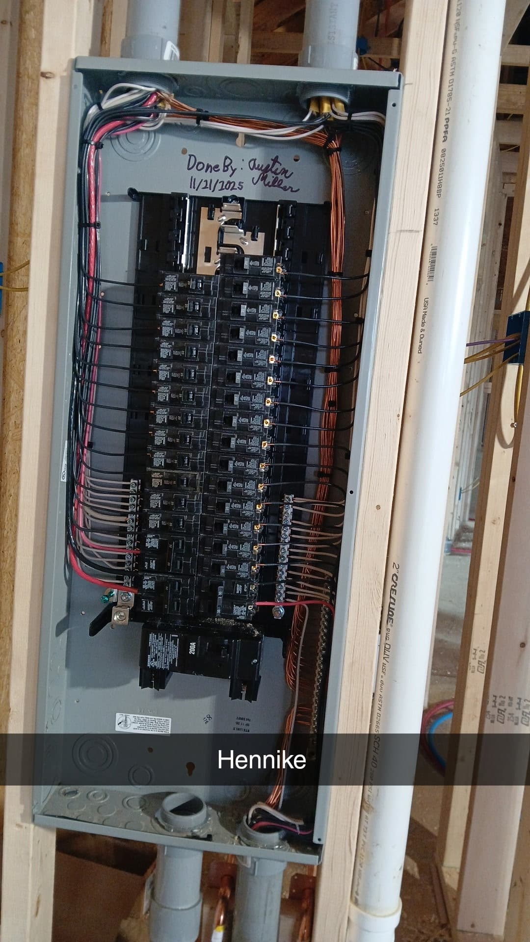 200-amp electrical panel installed in new construction framing by Primeline Electrical