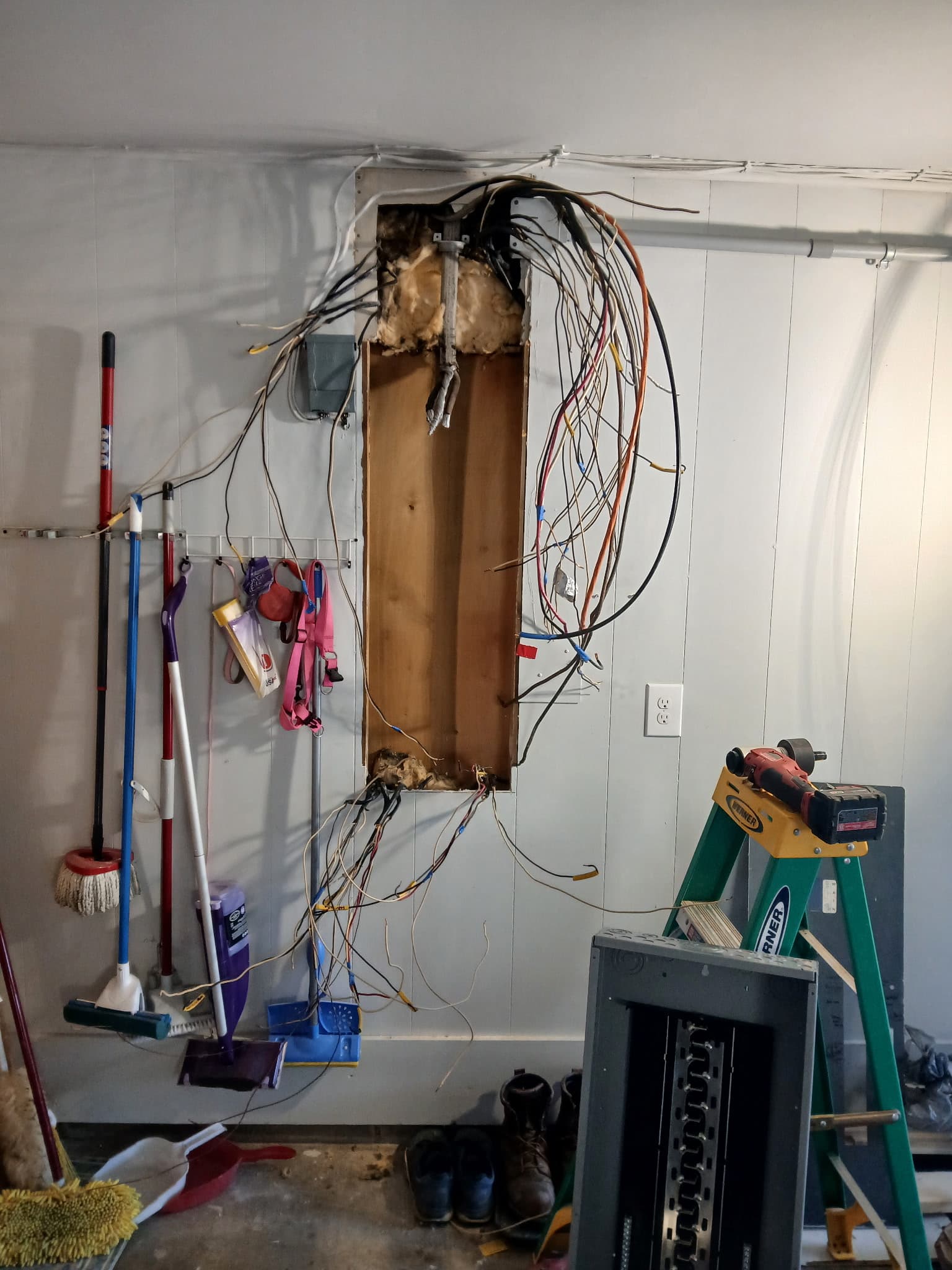 Old wiring being replaced during a whole-house rewire by Primeline Electrical